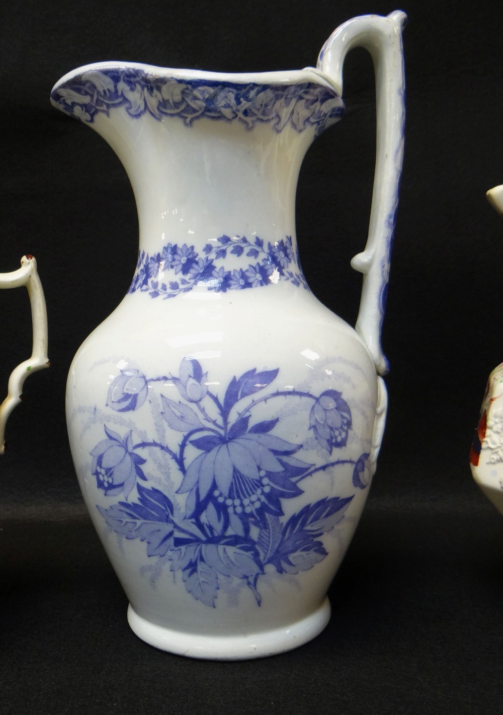 SEVEN VARIOUS WELSH POTTERY JUGS including named Swansea floral decorated jug for 'John Jenkins - Image 4 of 5
