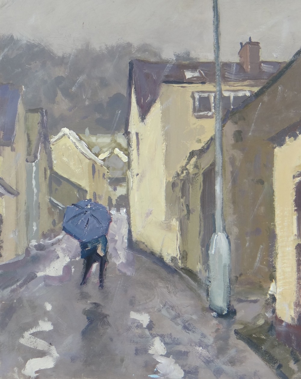 GARETH THOMAS oil on board - figure walking in Welsh town in the rain, signed, unframed, 32.1 x 25.