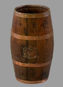 ANTIQUE OAK COOPERED BARREL STICKSTAND with copper banding and trace elements of an applied crest,