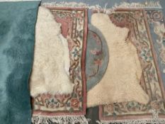 CHINESE WASHED RUGS and sheepskin type rugs, an assortment (7), example length (green coloured