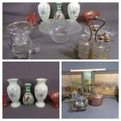 OIL LAMPS (2) with iron bases and coloured glass reservoirs, two pairs of brass candlesticks, a