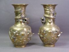 CHINESE BRASS DRAGON VASES, a pair, 25cms H
