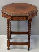 CARVED OAK OCTAGONAL TOP TABLE on barley twist supports having acorn and oak leaf detail to the