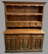 REPRODUCTION KITCHEN DRESSER, Eastern hardwood, having a two shelf rack with shaped frieze and six