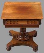 REGENCY MAHOGANY GAMES/WORK TABLE having a single side drawer with compartmented interior, on a leaf