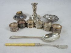 SMALL SILVER, 7 ITEMS and four white metal napkin rings, the silver items include a 20.75cms