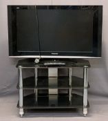 PANASONIC VIERA 36IN FLATSCREEN TV WITH REMOTE CONTROL - on a black glass and chrome three tier