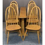 ERCOL LIGHT ELM DROP-LEAF DINING TABLE and six high hoop stick back chairs, labels attached to some,