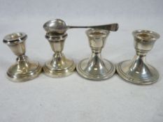 BIRMINGHAM SILVER SQUAT CANDLESTICKS, TWO PAIRS and one odd teaspoon, 1962 pair 7cms H, 1976 pair