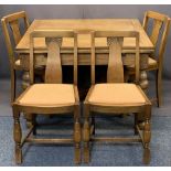 GOOD VINTAGE OAK DRAW LEAF DINING TABLE & FOUR CHAIRS - the table on substantial bulbous and block