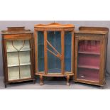 THREE VINTAGE CHINA DISPLAY CABINETS to include a single door oak example with railback and interior