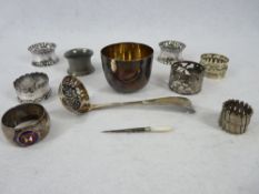 SMALL SILVER, 4 ITEMS, plated and other napkin rings, one bearing enamel badge for R M S Ranchi, the