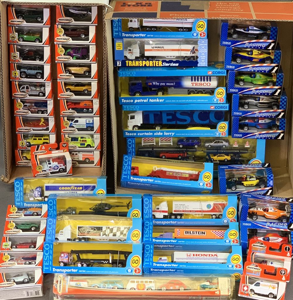 DIECAST MODEL VEHICLES - Tesco boxed transporters and Matchbox 'Hero City' and others, approximately