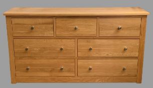 MODERN CHEST OF DRAWERS - large in oak effect with three over four drawers, 97cms H, 180cms W, 45cms