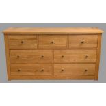 MODERN CHEST OF DRAWERS - large in oak effect with three over four drawers, 97cms H, 180cms W, 45cms