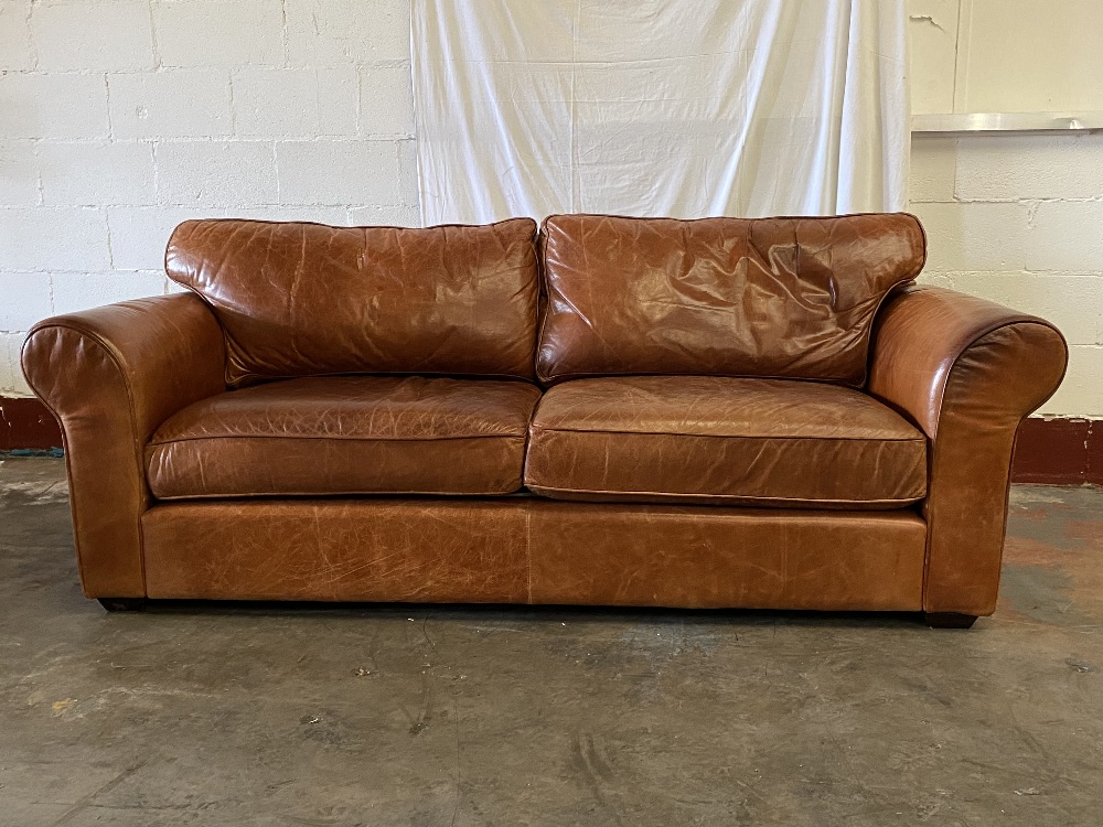 VINTAGE TYPE SOFA in tan leather/leather effect, 88cms H, 238cms W, 98cms D, labelled as 'Buffalo - Image 2 of 4