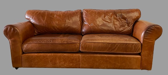 VINTAGE TYPE SOFA in tan leather/leather effect, 88cms H, 238cms W, 98cms D, labelled as 'Buffalo