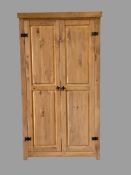 PINE WARDROBE - two door with black japanned furniture, 190cms H, 104cms W, 59cms D