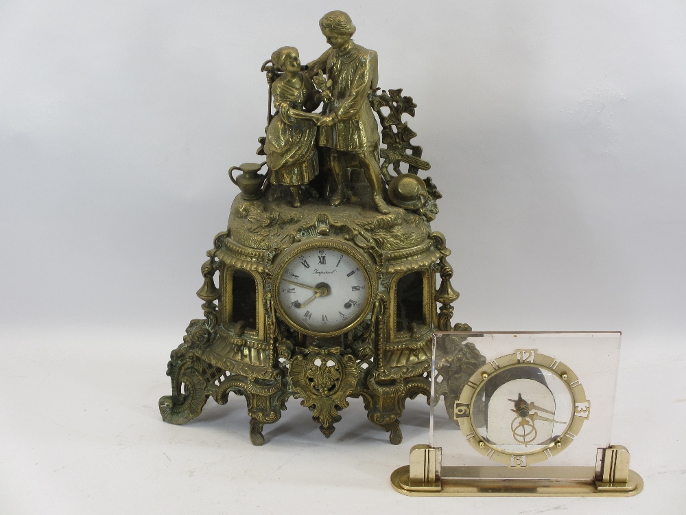 FRENCH STYLE CAST BRASS MANTEL CLOCK - the enamel dial marked 'Imperial' and an Art Deco style