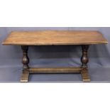OAK TRESTLE REFECTORY TABLE with substantial baluster supports and pegged joints, 73cms H, 166cms W,