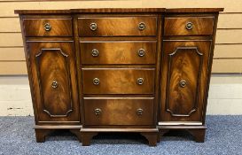 REPRODUCTION MAHOGANY BREAKFRONT SIDEBOARD - neatly proportioned having four central drawers flanked