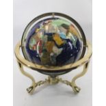 MODERN GEMSTONE GLOBE - in a brass effect gimbal stand, 50cms H, 43cms diameter approximately the