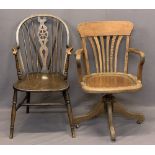 VINTAGE OAK SWIVEL OFFICE ARMCHAIR and a later wheelback spindle armchair on turned supports,