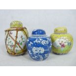 CHINESE PRUNUS DECORATED JAR - with double ring mark and two yellow ground jars, one decorated