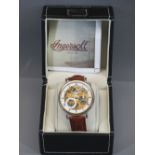 A CASED INGERSOLL CALIBRE 417 IN7900 MECHANICAL AUTO RESISTANT WRISTWATCH - cased, the yellow