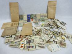 VINTAGE CIGARETTE & TEA CARDS, a good mixed quantity, in original cigarette packets and loose,