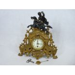 FRENCH CLOCK - Ormolu with mythical horse rider to the top, 34.5cms tall
