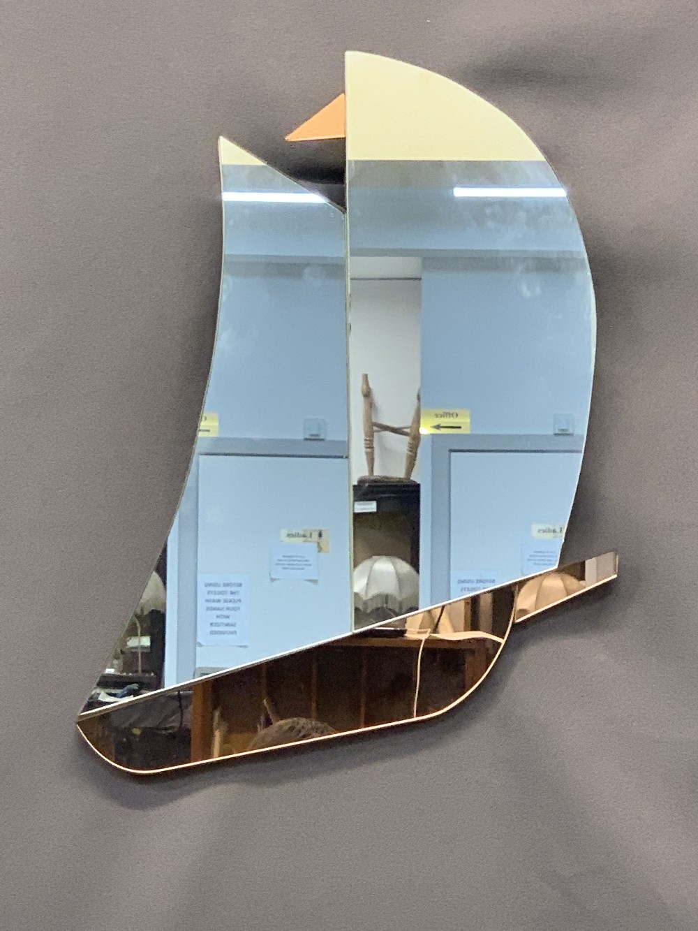 ART DECO YACHT SHAPED WALL MIRROR - the hull and flag in pink tinted glass, 51 x 39cms