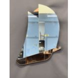 ART DECO YACHT SHAPED WALL MIRROR - the hull and flag in pink tinted glass, 51 x 39cms