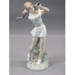 NAO POTTERY FIGURINE - a young girl golfer with club in hand