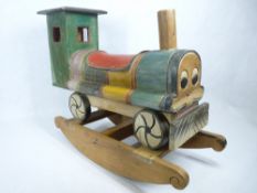 CHILD'S ROCKING TRAIN WOODEN SIT ON TOY in colourful livery, 51.5cms H, 70cms L