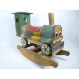 CHILD'S ROCKING TRAIN WOODEN SIT ON TOY in colourful livery, 51.5cms H, 70cms L