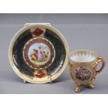 VIENNA CUP & SAUCER - the cup with twin split serpent handles on three pad supports and with a panel