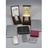 CHROME GENT'S CIGARETTE CASES (2), an Oriental black lacquered cigarette case with pattern to the