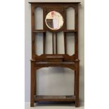 EDWARDIAN HALLSTAND with central circular bevelled glass mirror, multi-hooks, shelves, central