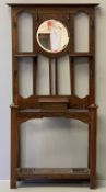 EDWARDIAN HALLSTAND with central circular bevelled glass mirror, multi-hooks, shelves, central