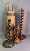 TREEN - twist candlesticks, 32cms the tallest, another carved candlestick and a conical shaped