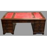 REPRODUCTION DESK - large example with three section red tooled leather effect surface, twin