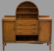 EDWARDIAN SIDEBOARD with domed top central rack, three drawers and two doors to the front, on turned