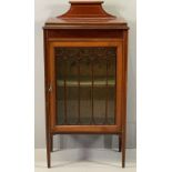 ANTIQUE MAHOGANY SINGLE DOOR DISPLAY CABINET with inlay, railback and on tapered supports, 121cms H,