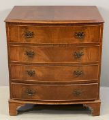 REPRODUCTION CHEST OF FOUR DRAWERS having a bow front, brass drop handles, on bracket feet, 85cms H,