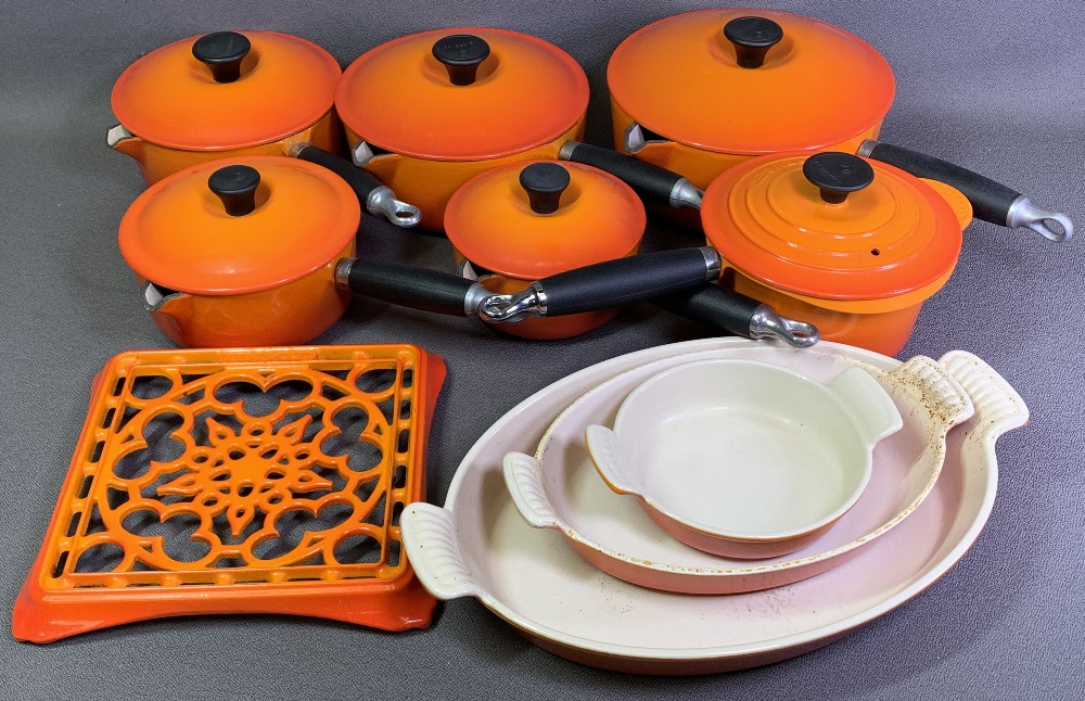 LE CREUSET COOKWARE - comprising six assorted pans with lids, flan dishes and stand