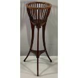 PLANTER STAND - antique mahogany with basket top and lion motifs, on curved tripod supports, 96cms