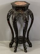 CHINESE CARVED HARDWOOD STAND with inset marble top, hexagonal top detail over six floriate carved