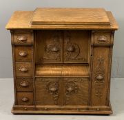 SEWING CABINET - fabulous example, antique oak carved Dutch style with Singer treadle sewing machine