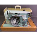 MID-CENTURY NEWHOME CASE SEWING MACHINE with pedal